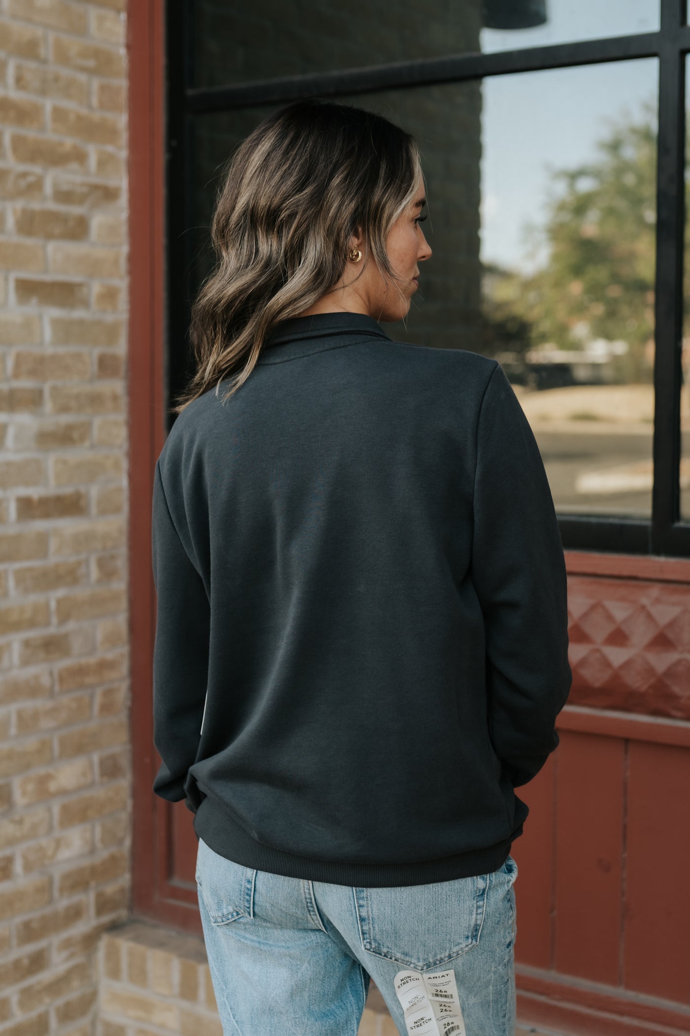 Wrangler Women's Long Live Cowboys Quarter Zip Pullover in Black 112361176