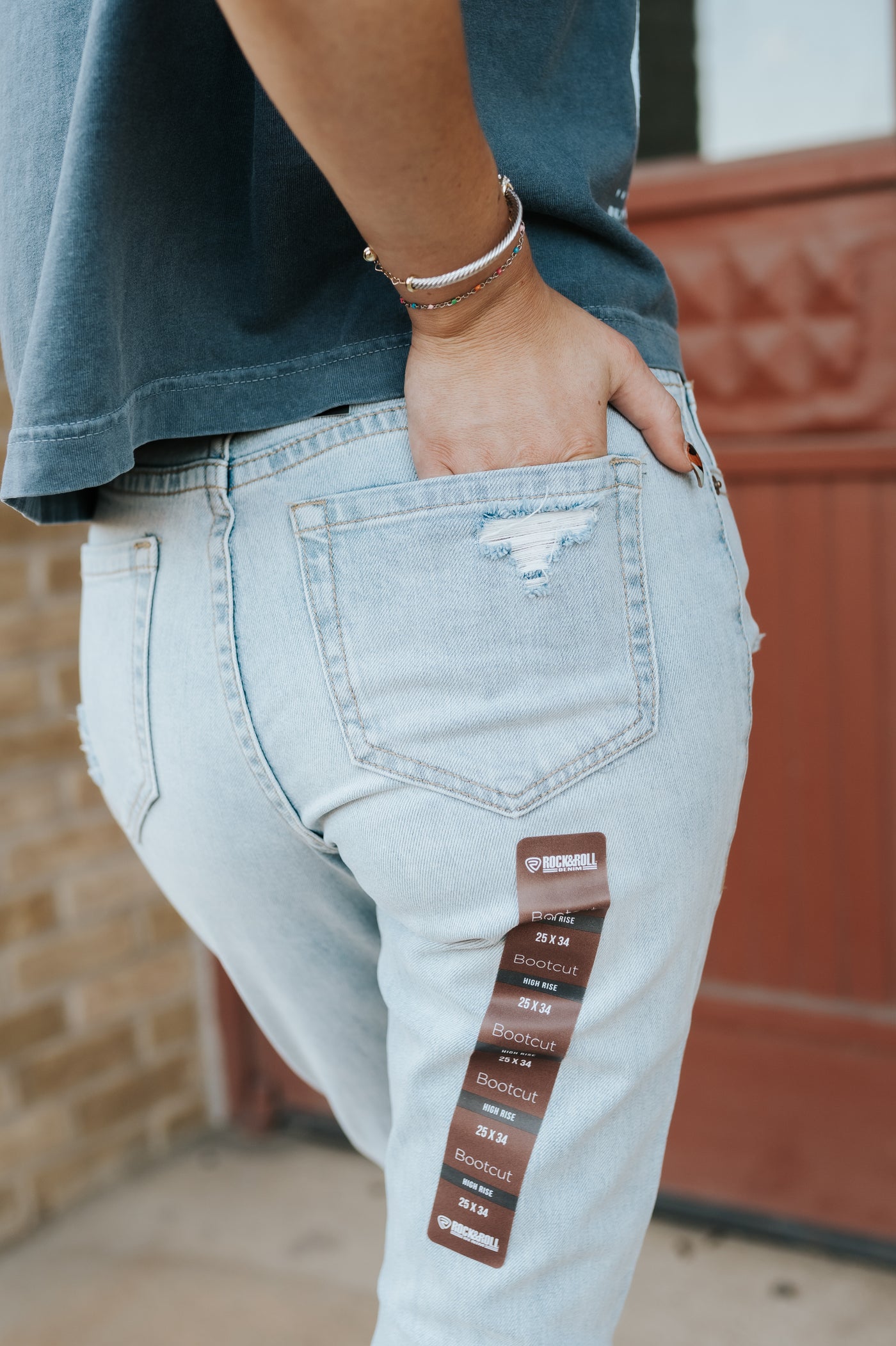Rock & Roll Women's Light Wash Distressed High Rise Bootcut Jean BW4HD06388