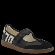 Aya in Black Milk Sneakerina