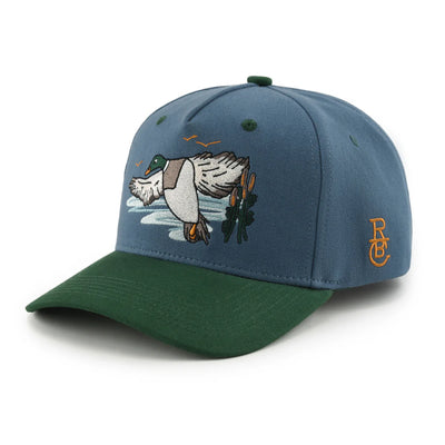 Raised by Coyotes Mallard Snapback Hat