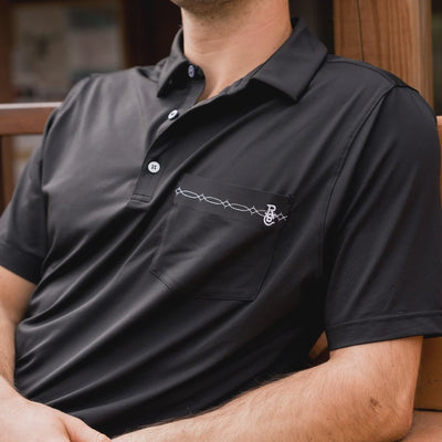 Raised by Coyotes Black Bootstitch Pocket Polo - Southern Soule Designs