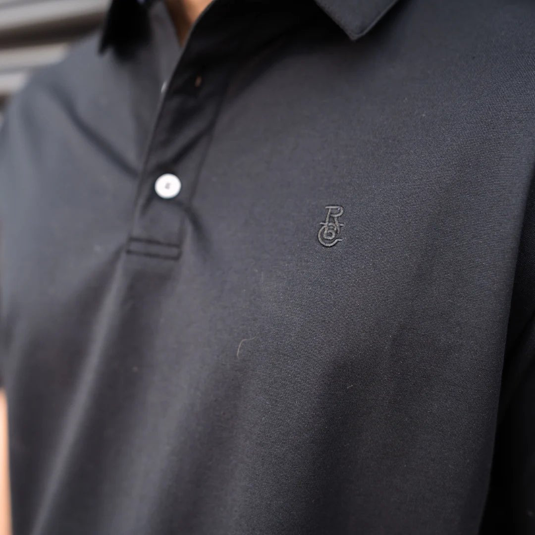 Raised By Coyotes Black Cotton Blend Polo - Southern Soule Designs