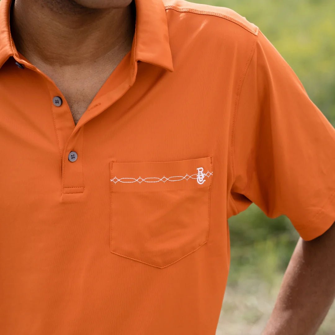 Raised by Coyotes Texas Orange Bootstitch Pocket Polo - Southern Soule Designs