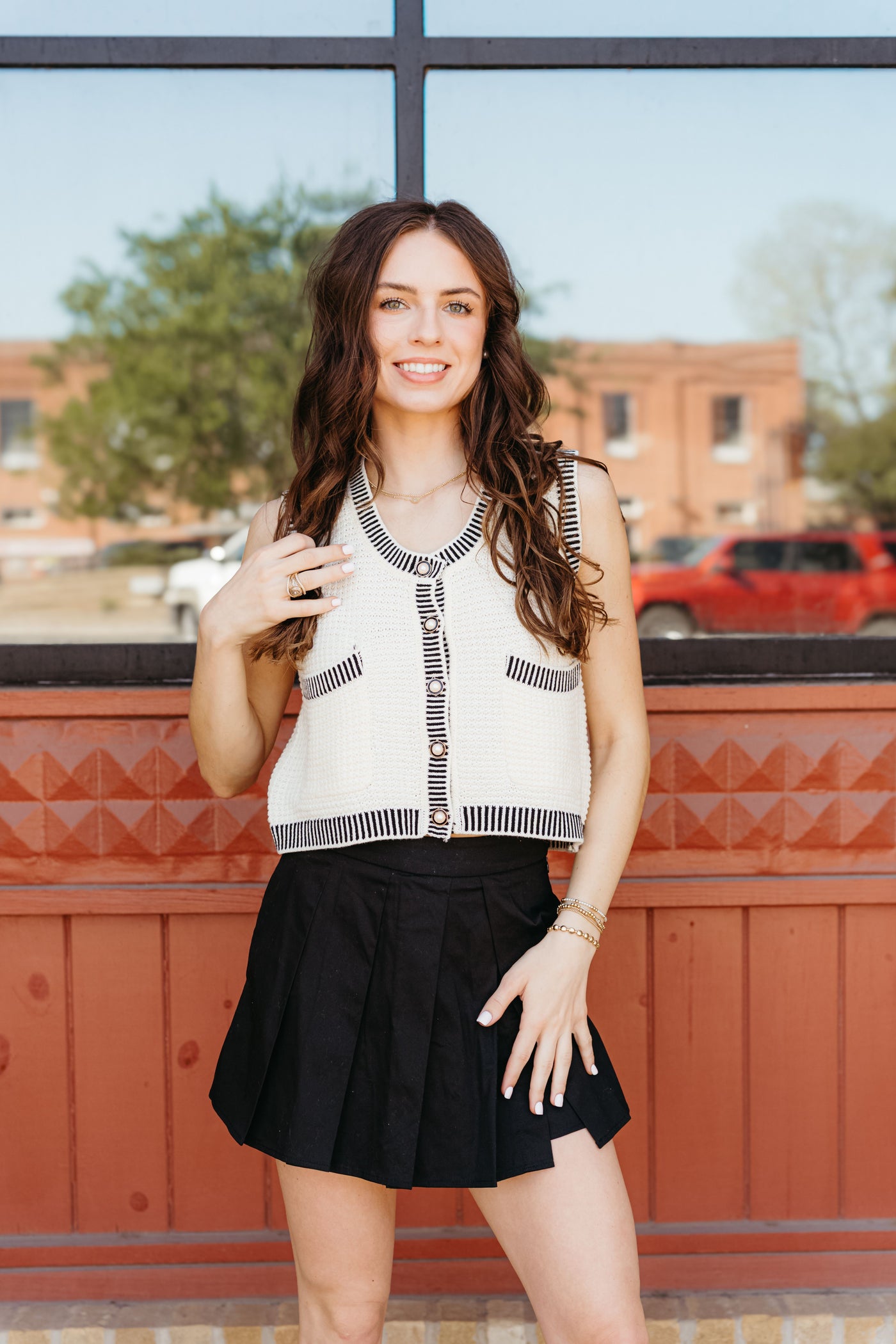 Cream Sweater Vest with Accented Pearl Button T25700
